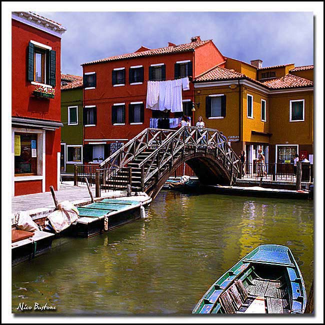 Burano - Venice -  A canal with a wooden bridge